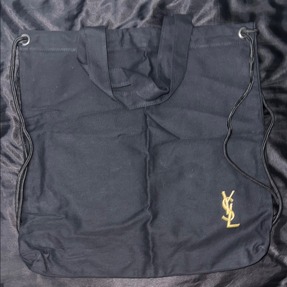 Yves Saint Laurent parfums Black and Gold drawstring Backpack. GWP